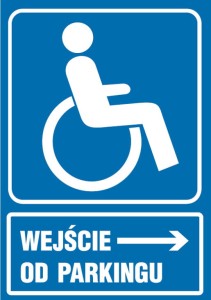 Znak Wejście dla niepełnosprawnych od parkingu
